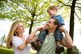 Young family having a great day out in the park (istockphoto.com)